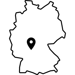 Symbol einer Deutschlandkarte mit einem Marker, der auf eine zentrale Position hinweist, repräsentiert Standort oder Herkunft innerhalb Deutschlands